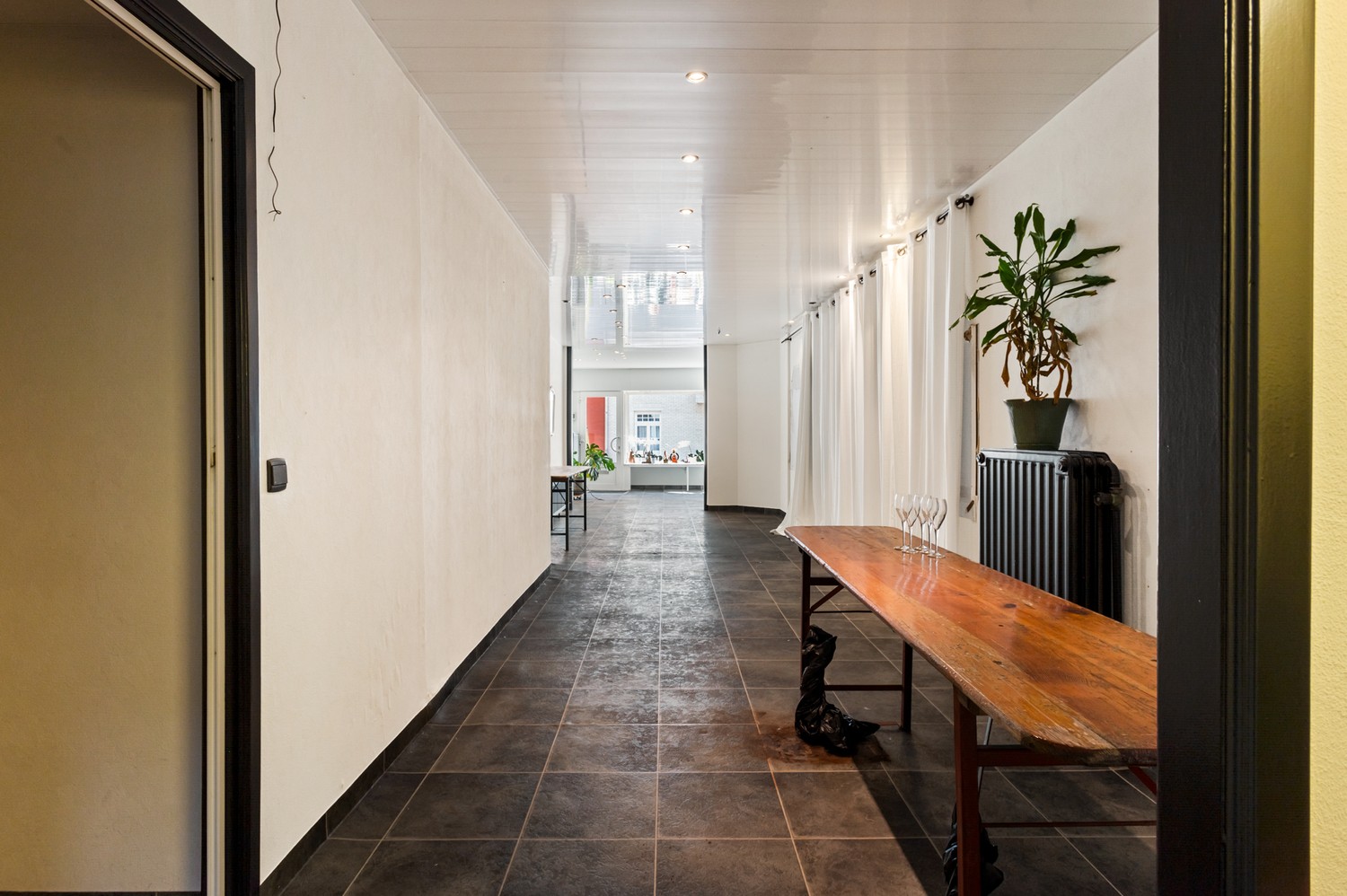 Handelsgelijkvloers met bovenliggend appartement in het centrum van Wommelgem! - foto 5