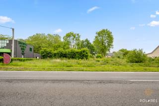 Are you looking for a spacious plot with excellent connections and a rural touch? This plot of 17a 90ca consists of a building plot of 10a supplemented with 7a 90ca of agricultural land, ideal for those who love space, greenery, and privacy.<br /><br />Thanks to its west orientation, the plot enjoys pleasant afternoon and evening light, ideal for making the most of sunny evenings in the garden and living spaces.<br /><br />The location on Liersesteenweg is a major asset due to its easy accessibility to surrounding municipalities and important thoroughfares. Shops, schools, public transportation, and other daily amenities are nearby, while the plot maintains an open and tranquil atmosphere.<br /><br />The building regulations offer numerous possibilities. There is a maximum ridge height of 11 meters and a maximum building depth of 17 meters on both the ground floor and the upper floor. A third storey is allowed beneath the attic. Both a basement and crawl space are possible. In terms of roof shape, a flat roof or a pitched roof up to a maximum of 55° can be chosen. In addition, an outbuilding with a maximum area of 40 m² may be constructed.<br /><br />An excellent opportunity to realize a spacious family home on a plot with great potential and a pleasant combination of accessibility, space, and greenery.