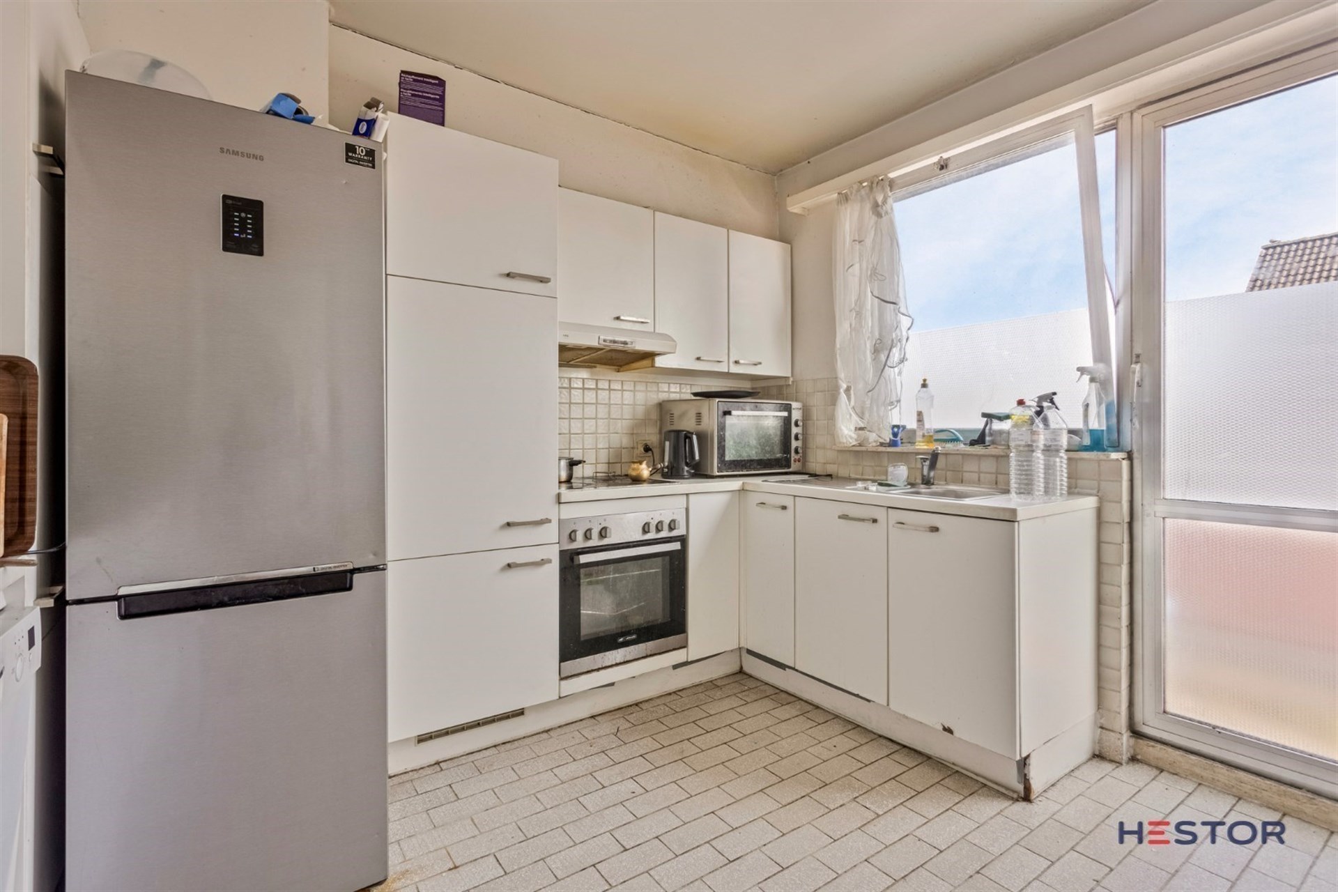 Lichtrijk twee slaapkamerappartement in het hartje van Temse - foto 4