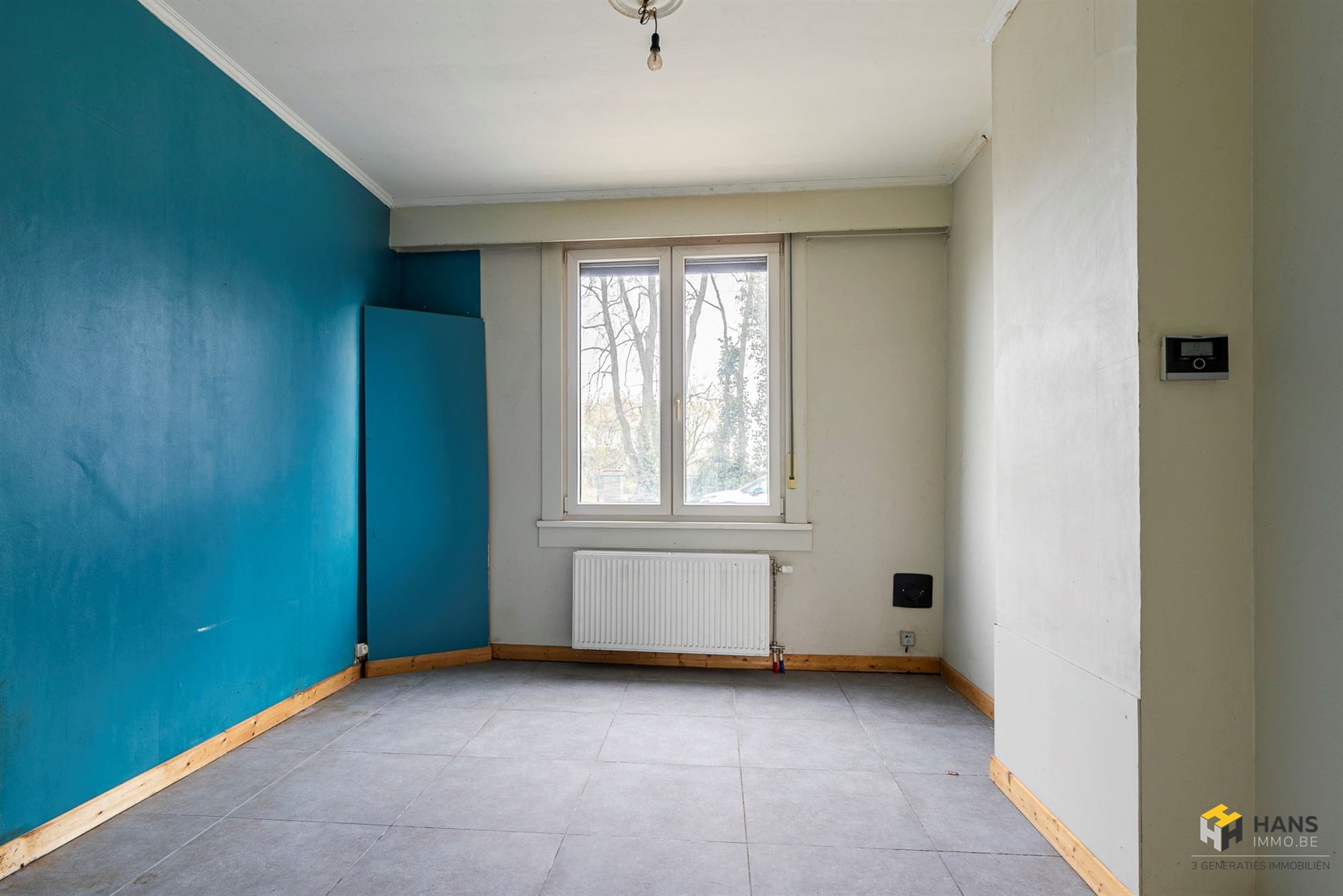 Charmante woning (117 m²) met 2 à 3 slaapkamers en zuid-west-georiënteerde tuin op een centrale locatie in Kapellen. - foto 5