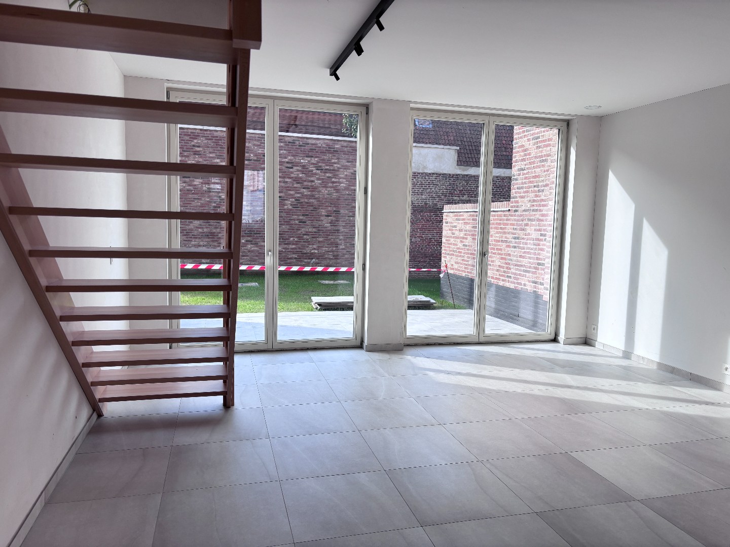 Lichtrijke nieuwbouwwoning met 3 slaapkamers, tuin en ondergrondse staanplaats - foto 5