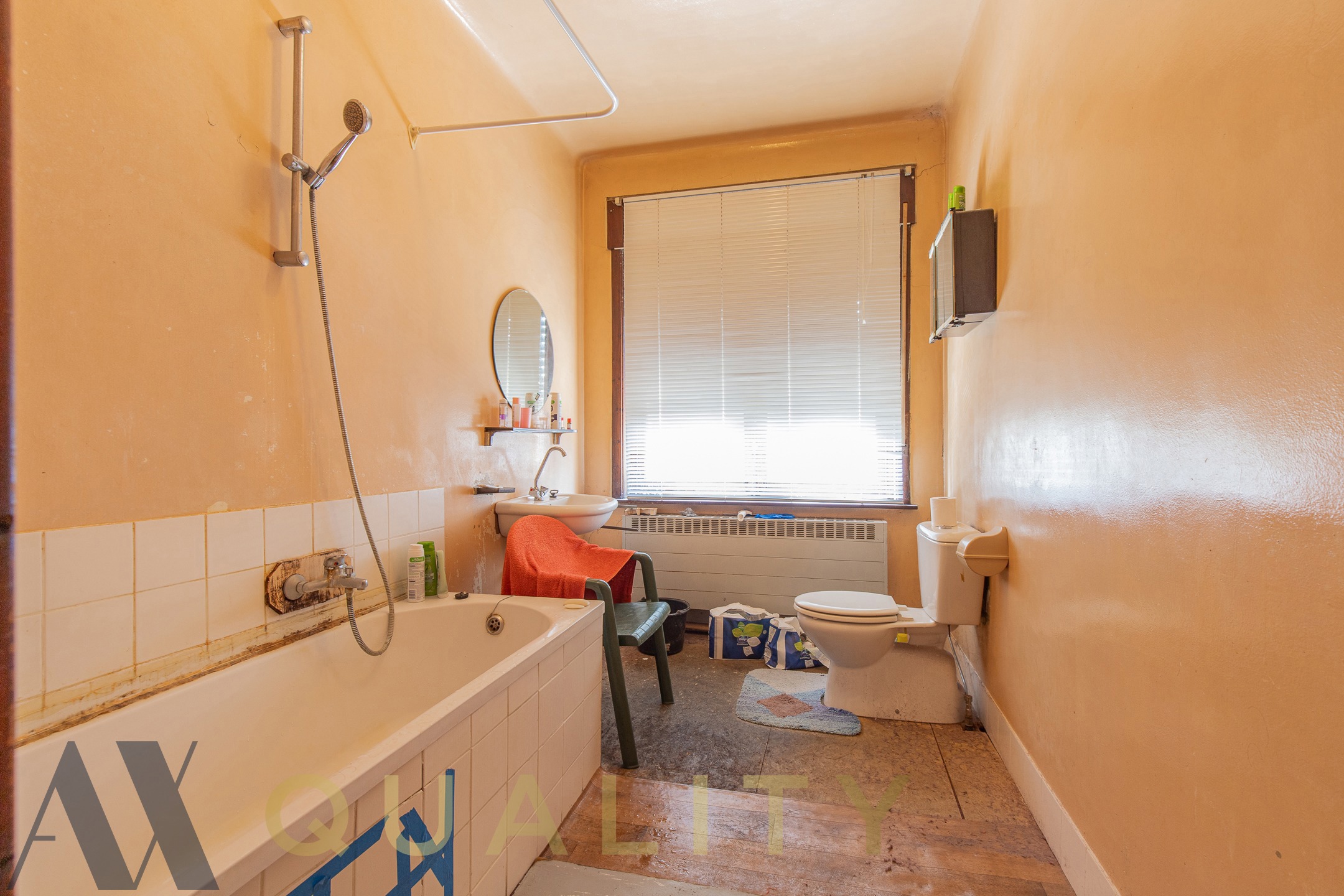 Nabij het centrum van Lebbeke gelegen te renov. rijwoning of bouwgrond op een terrein van 2 are 80 ca.  - foto 5