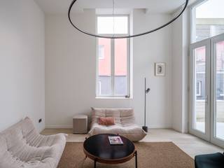 Architecturaal appartement (96 m2) met ruim buitenterras in centrum Gent Een discrete maar uitzonderlijke realisatie naar ontwerp van Marie-Josée Van...