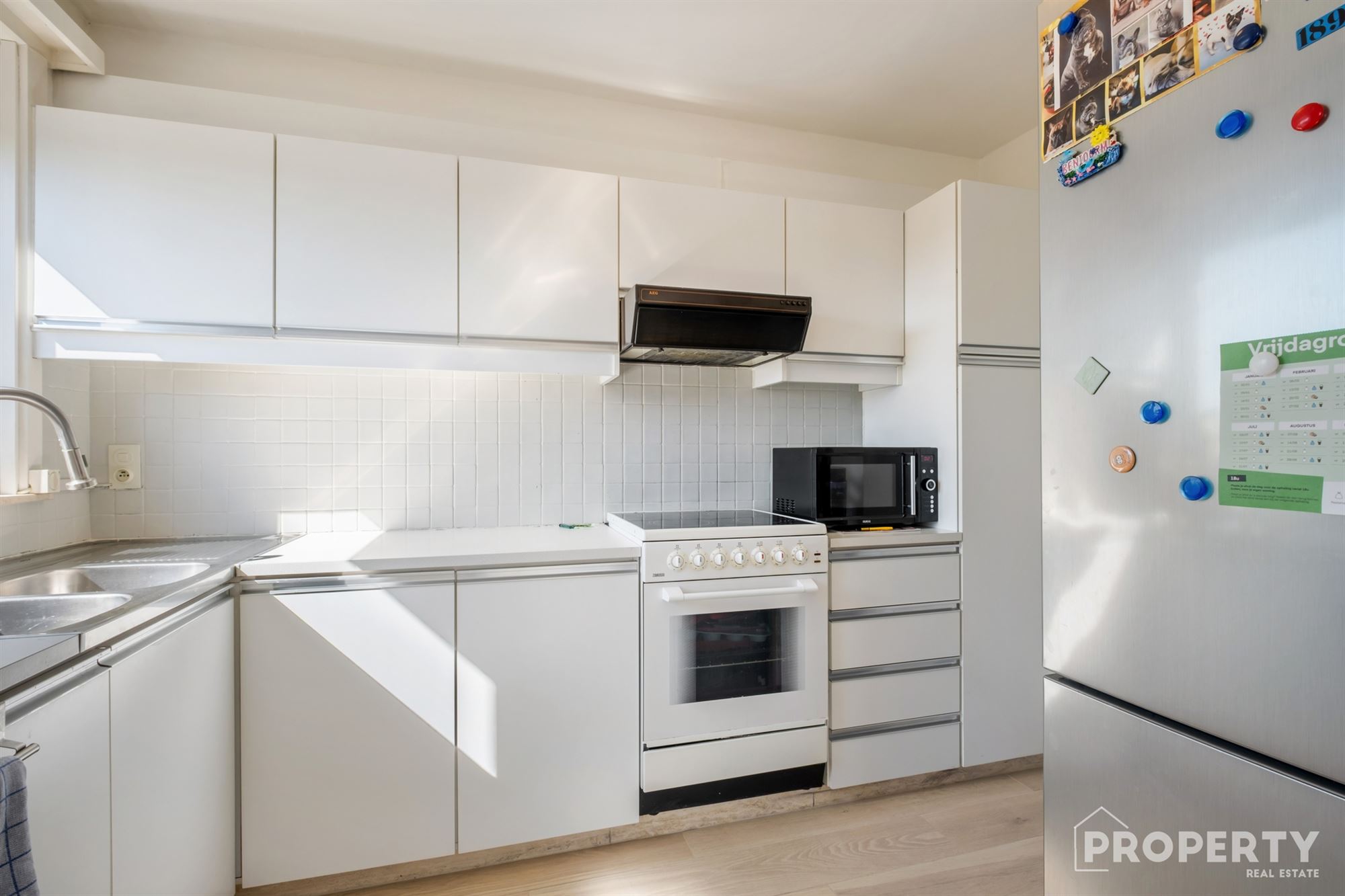 Instapklaar ruim appartement met 2 slaapkamers en garage! - foto 5