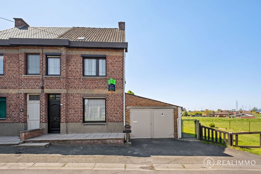 Renovatieproject met uitbreidingsmogelijkheden in rustige straat - photo 4