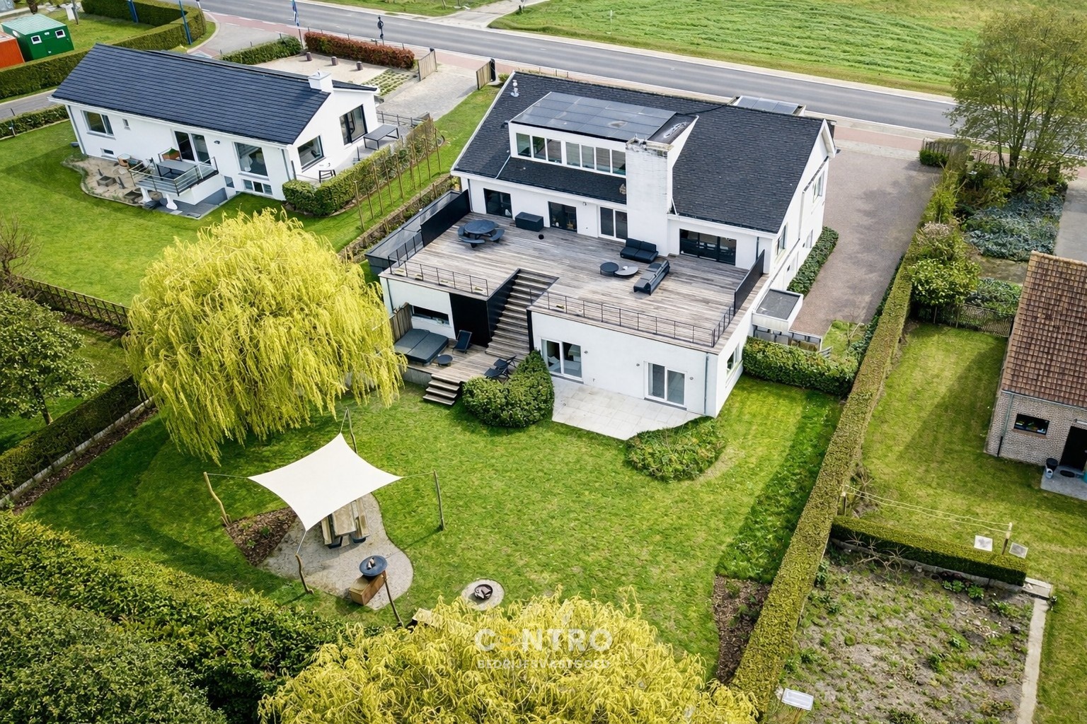 Modern en instapklaar WOON-WERKPAND met professionele ruimten, lichtrijk &amp; ruim APPARTEMENT met zonneterras en aangelegde tuin. - foto 2