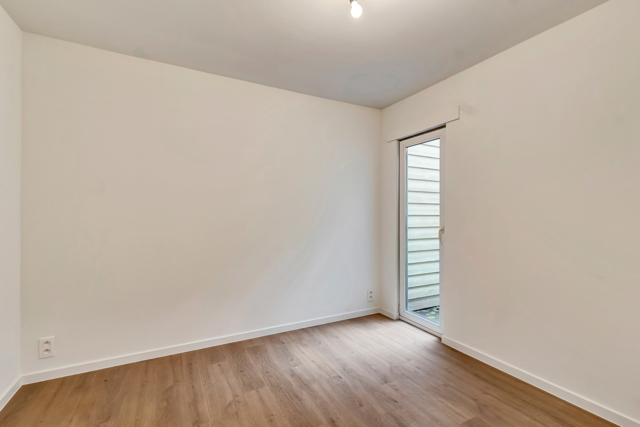 Instapklaar gelijkvloers appartement met tuin nabij centrum - foto 4