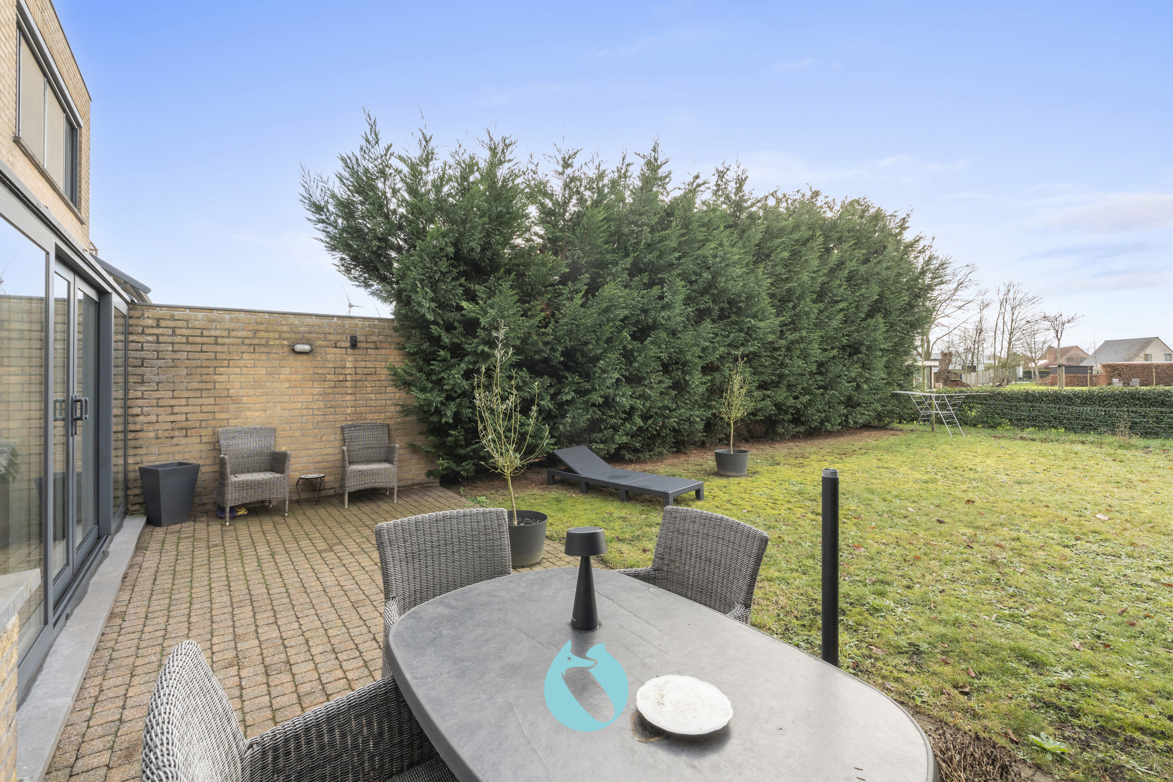 Gelijkvloers appartement met 2 slpks, tuin en garage - foto 4