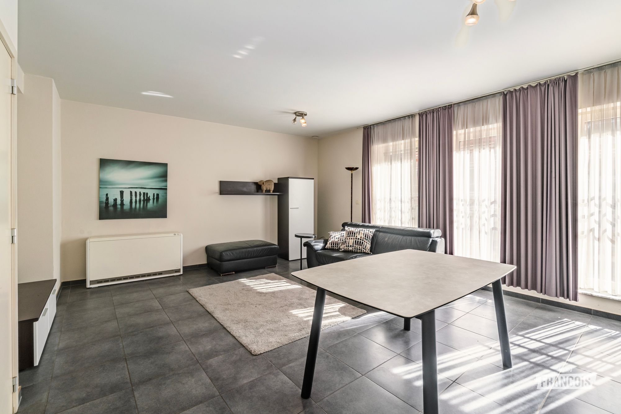 Lichtrijk tweeslaapkamerappartement te koop in Sint-Joost-ten-Node - foto 4