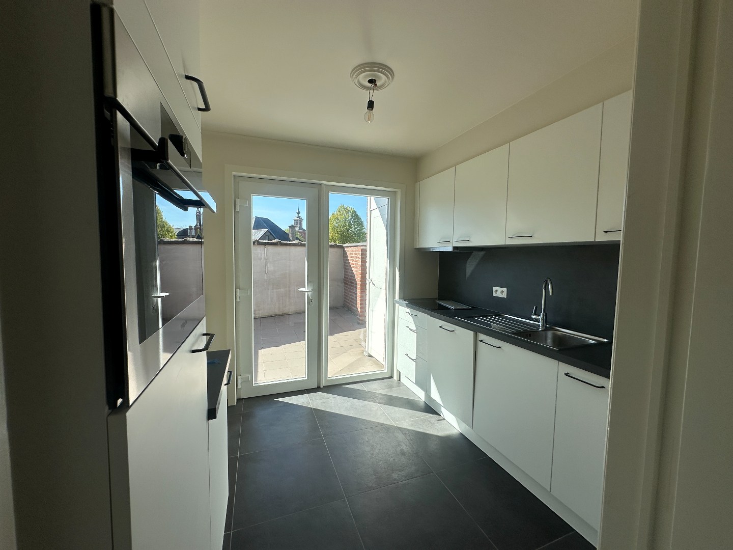 Ruim duplex appartement in centrum van Evergem - foto 4