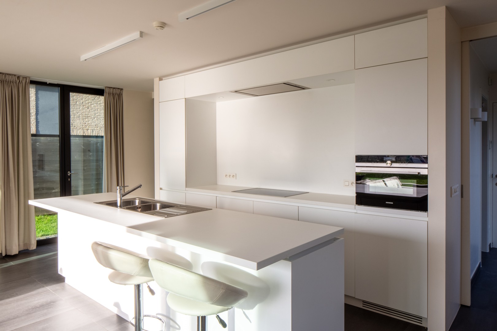 Nieuwbouw duplexappartement met tuin op strategische locatie - foto 5