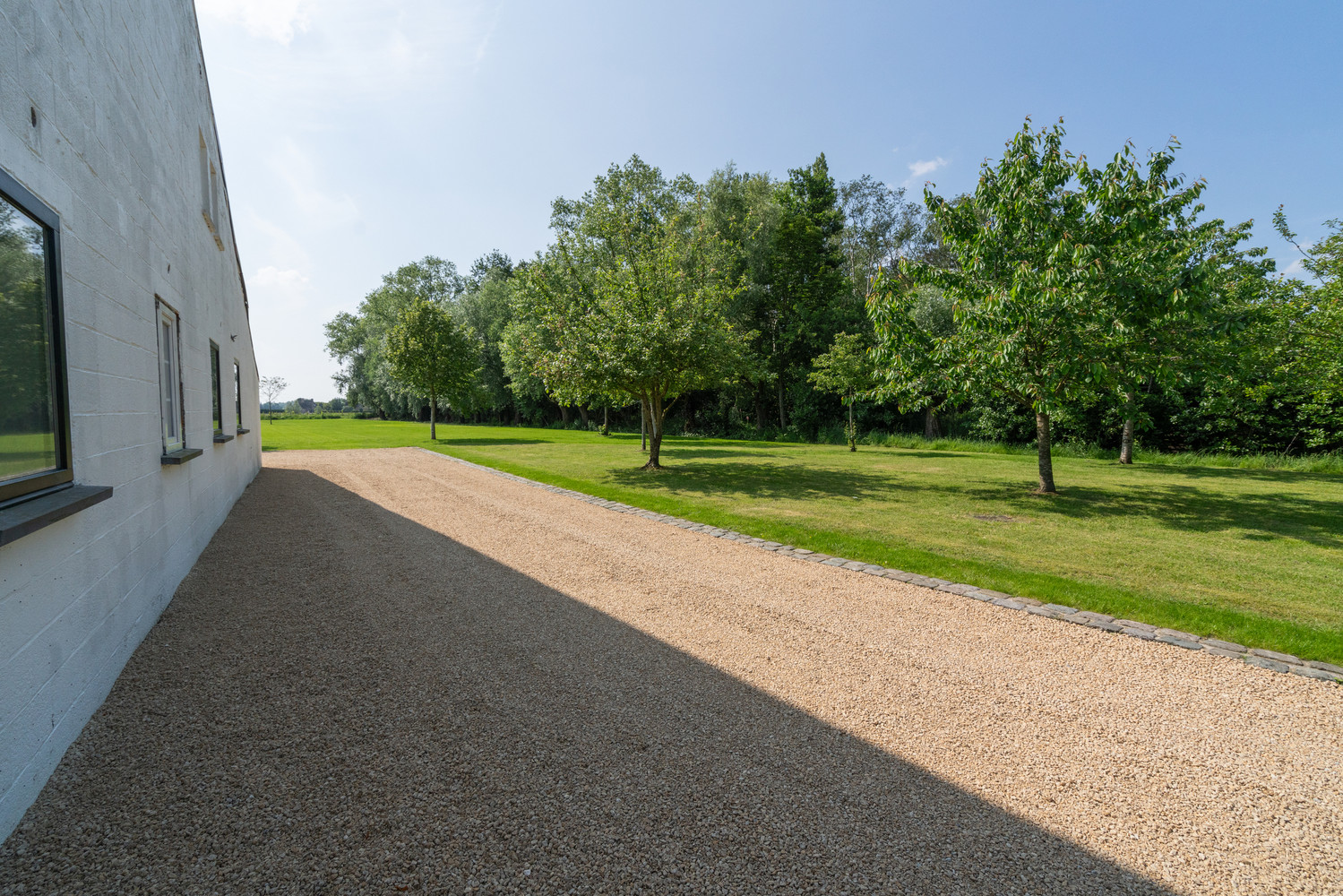 Prachtig landhuis met meerdere polyvalente bijhuizen, zwembad en prachtige zichten over de weidse polders - foto 5