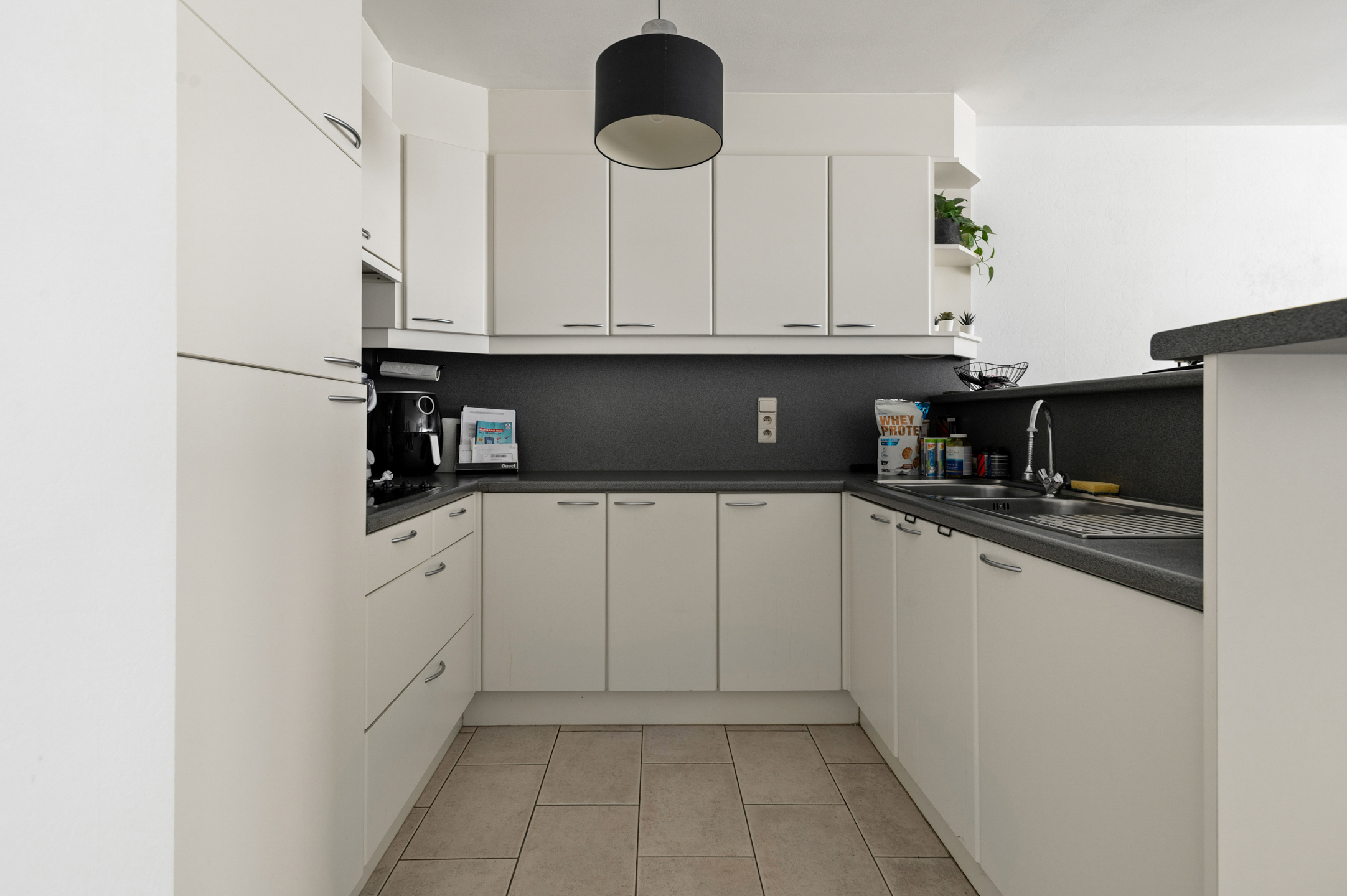 Gezellig appartement met 2 slaapkamers, terras, garage. - foto 5