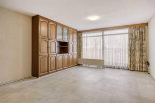 Appartement met één slaapkamer te koop nabij centrum van Borsbeek, met EPC A.Indeling: inkomhal, living met ingemaakte kasten en open keuken,...