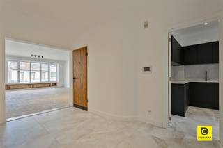 <p><span>Luxurious penthouse with breathtaking roof terrace</span></p><p><span>This penthouse is located in a recent and well maintained building near Harmonie and PAKT, an initiative of creative entrepreneurs and urban farmers with a focus on greener living, self-sufficiency, culture and gastronomy. Are you looking for a tasteful and high-quality finished rooftop apartment with 2 bedrooms, an extensive living space with open kitchen and lots of outdoor space? Look no further, this oasis of calm in the middle of the bustling city life is a unique opportunity to raise your quality of life to an unseen level.</span></p><p><span> </span></p><p><span>Entrance hall, toilet & storage room:</span></p><p><span>Through the steel security door you enter the entrance hall with videophone and smoke detector. The eye immediately catches the beautiful parquet floor that was extended throughout almost the entire apartment. The toilet is separate and includes a hand-washer. You have a separate storage room in the apartment itself, a very functional space on ceramic tiled floor that also houses the alarm system. </span></p><p><span> </span></p><p><span>Living room & kitchen:</span></p><p><span>The spacious living space of no less than 50m² is accentuated by an abundance of natural light and a fairy-like view of the Harmony park thanks to the many and large windows that reach to the floor. Any type of interior comes into its own here and with an area like this you have no restrictions. The characterful open kitchen with sitting area was wonderfully integrated into the living space, ensuring a sense of space. It sits on an authentic tile floor and features a "state of the art" stove with 5-burner induction stove, oven and grill. You also have a range hood, inset refrigerator, 3-drawer freezer and dishwasher. Additional eye-cathers are the built-in sink with checkerboard pattern and the natural stone worktop. There is no lack of storage and workspace.</span></p><p><span> </span></p><p><span>Bedrooms, bathroom & laundry room:</span></p><p><span>In the master bedroom (13m²) with fitted wardrobe, also on parquet, it is pleasant to wake up with a view of the park. Including complete privacy, you will undoubtedly find complete relaxation here. The other bedroom is located at the rear and includes custom-made closets on both sides. This room could also serve as the ideal dressing room, office space, hobby room, playroom or guest room. In the charming and fully tiled bathroom you will find a large corner bath with shower, a character washbasin and mirror with LED lighting. There is a separate laundry room which also houses the central heating boiler and adjustable ventilation system. </span></p><p><span> </span></p><p><span>Terraces & car parking space:</span></p><p><span>The first terrace is located at the front of the building, adjacent to the living space. It enjoys a SW orientation, a nice view without any overlooking and is equipped with a light point. The absolute icing on the cake is the huge roof terrace (60m²). </span></p><p><span>The perfect place to receive your guests, throw a party or enjoy the sun in peace and quiet, with or without a glass in hand. This place makes all mouths drop thanks to the 360° view over all of Antwerp, nowhere does the city skyline come into its own better. Also for those with green fingers, the roof terrace is a godsend, you can fully indulge yourself here and create a true urban garden high above the first floor. Water, electricity and light are provided, as well as a garden shed and the necessary anchor points to install a shade cloth. An underground car parking space should be purchased in addition at € 35,000. </span></p><p><span> </span></p><p><span>Additional assets:</span></p><p><span>- Underfloor heating - Alarm system - Mobiscore 9.6 - EPC 133/B - EK compliant - Individual meters - Bicycle storage room</span></p><p><span> </span></p>