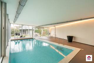 Te koop: gerenoveerde open bebouwing in Berchem-Sainte-Agathe, op een zuidgericht perceel van 14a79ca.Deze luxevilla uit 1965 werd volledig vernieuwd...