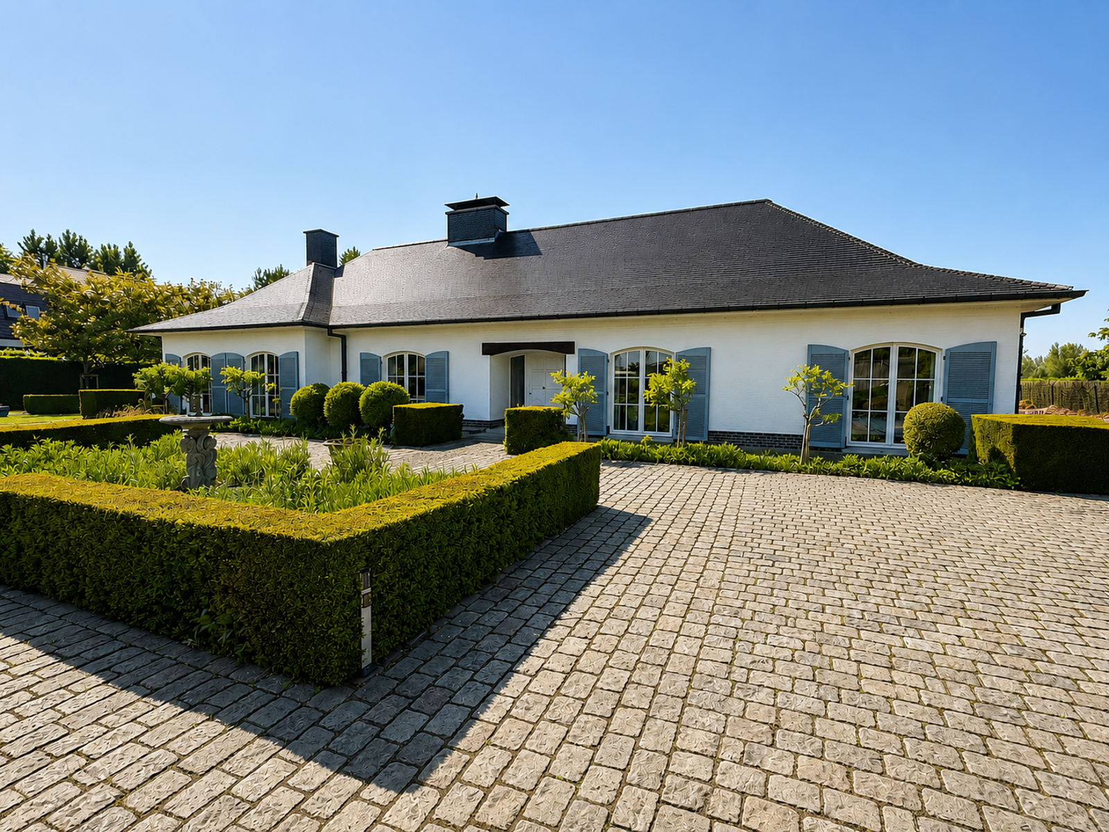 EXCLUSIEVE VILLA MET ADEMBENEMENDE TUIN TE WAREGEM OP 2356M² - foto 4