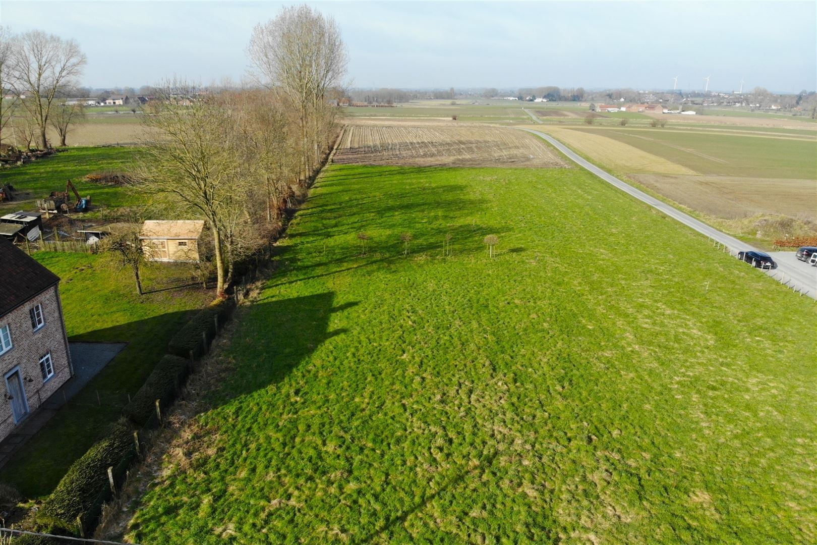 1342 m² zonovergoten bouwgrond met landelijk zicht - foto 2