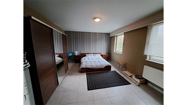 Een ruime woning met tuin nabij het centrum van Vlimmeren - foto 5