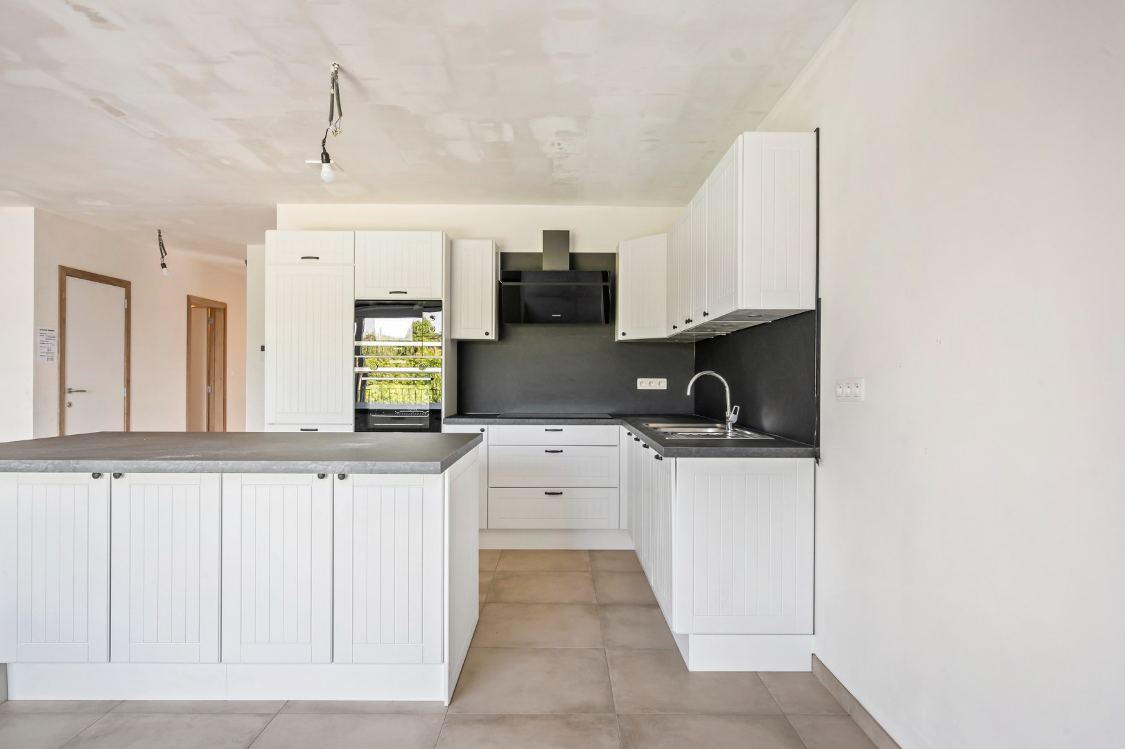 NIEUWBOUWAPPARTEMENT MET EPC A, 3 SLPKS EN 2 ZONGERICHTE TERRASSEN - foto 2