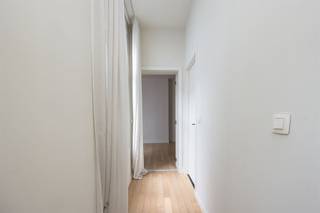 Cool, bright, move-in ready apartment in the trendy St. Andries neighborhood.You enter the building in the common hall, with its high ceilings, cornices and original wooden staircase, after which you step towards the apartment on the second. The entrance hall here has a black tiled floor; a separate guest toilet and connection for your washing machine.From here, it's off towards the open kitchen. This is fully installed and timeless, thanks to its black backsplash, and cabinetry and countertops. You have an electric fire here with built in cooker hood, sleek dark sink, fridge freezer, dishwasher and lots of cabinet space. You easily put a large dining table here, and yet it always feels spacious here, thanks to the high ceilings and windows at the back of the building. The laminate runs nicely into the living area, here you have plenty of room to create a cozy TV nook and place a desk. A huge amount of light enters through the high windows.Through the hall you go towards the bathroom, which itself has a tiled floor, a tiled walk-in shower, double sink with mirror and base cabinet and a towel dryer.The rear bedroom is very spacious at 2 m2, and has the same well-kept laminate flooring as well as a fly window. Bonus: there is already a closet!If interested, please apply via the following link: