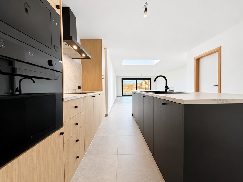 Energiezuinige gezinswoning (A) met 4 slaapkamers, dressing, bureelruimte en zonnige tuin met doorgang tot vooraan (vloerverwarming & zonnepanelen) - foto 4