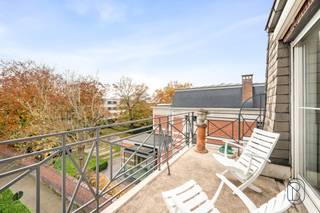 Uniek en luxueus penthouse op de bovenste verdieping, omgeven door een prachtig uitzicht op het park en het gerestaureerde kasteeltje...