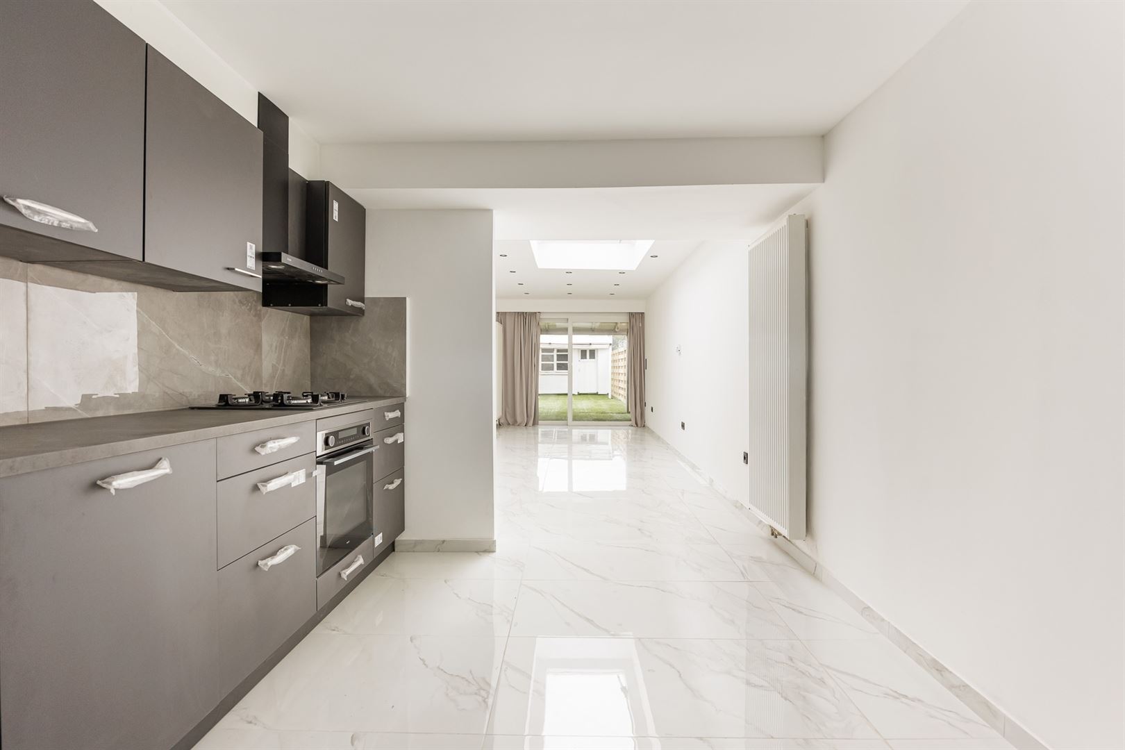 Volledig gerenoveerd & Energiezuinig: Ruime gezinswoning met 3 slaapkamers - foto 3