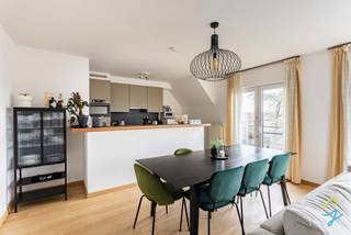 FOR SALE in GENTBRUGGE<br /><br />This spacious duplex flat welcomes you with a pleasant and light-filled living area with polished parquet flooring, which flows seamlessly into an open-plan kitchen. The well-thought-out layout and abundant natural light create a warm and inviting living environment.<br /><br />The flat has two spacious bedrooms, also finished with stylish polished parquet flooring, and two toilets for extra comfort. The bathroom is equipped with a bath with shower, washbasin, toilet and connection for a washing machine. <br /><br />This flat also scores particularly well in terms of practical amenities: there is a communal bicycle storage room and this spacious duplex flat comes with an underground parking space (purchase price €26,000).<br /><br />Additional features that further enhance the comfort of living:<br /><br />- New condensing boiler with condensing chimney (2023)<br />- New kitchen appliances: oven, dishwasher, hob and extractor hood (2022)<br />- Polished parquet flooring in the living room, staircase and bedrooms (2021)<br /><br />In short, a ready-to-move-in, stylish duplex flat in a quiet and green location, with excellent accessibility and all the comforts for pleasant living.<br /><br />Don't miss this opportunity and contact us today for more information or to schedule a viewing.<br /><br />Contact Ruben on 0479/ 03 90 17 or email ruben@cornelis-goeman.be