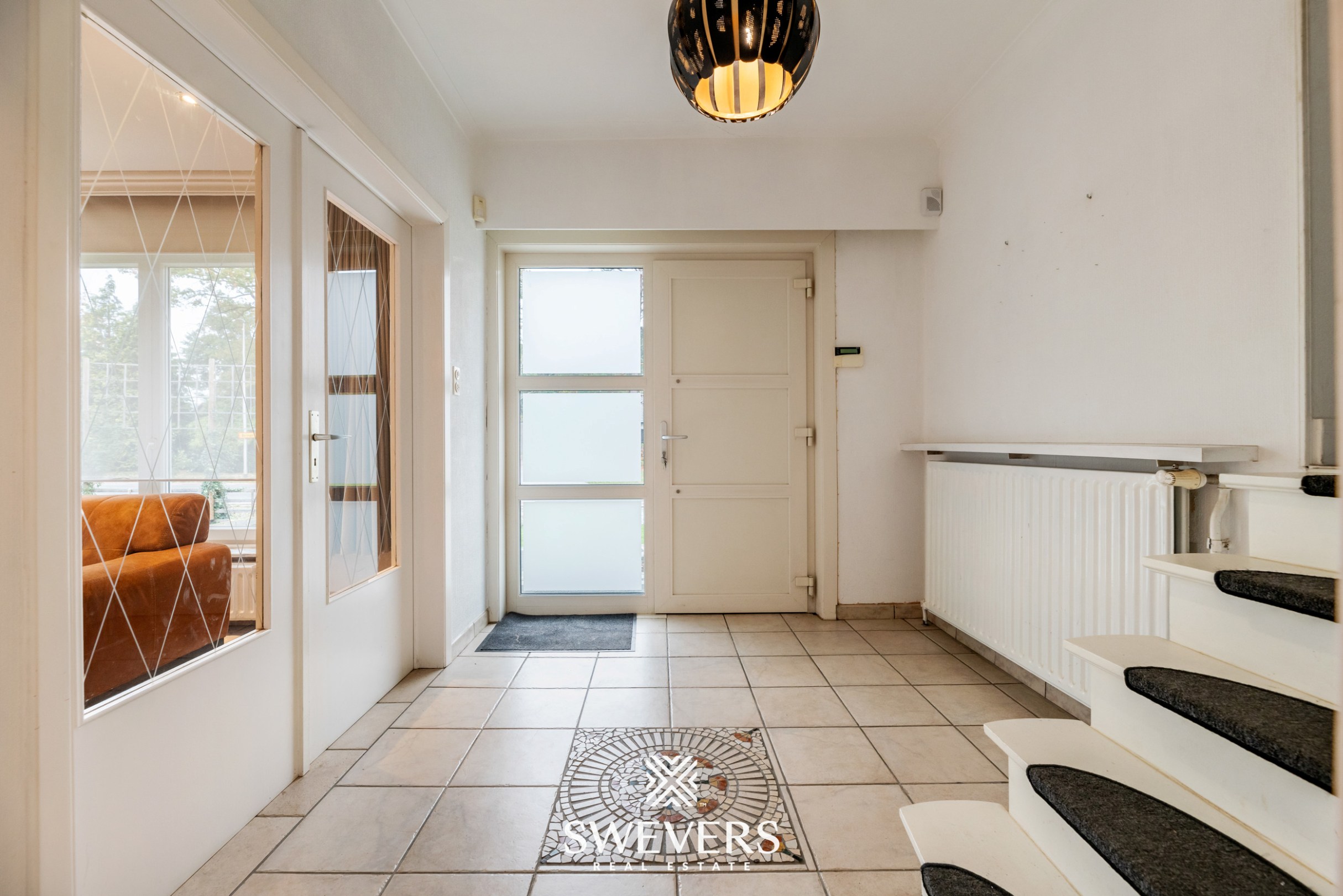 Instapklare gezinswoning met 3 slaapkamers, ruime kelder en zuidgerichte tuin in Beringen - foto 3