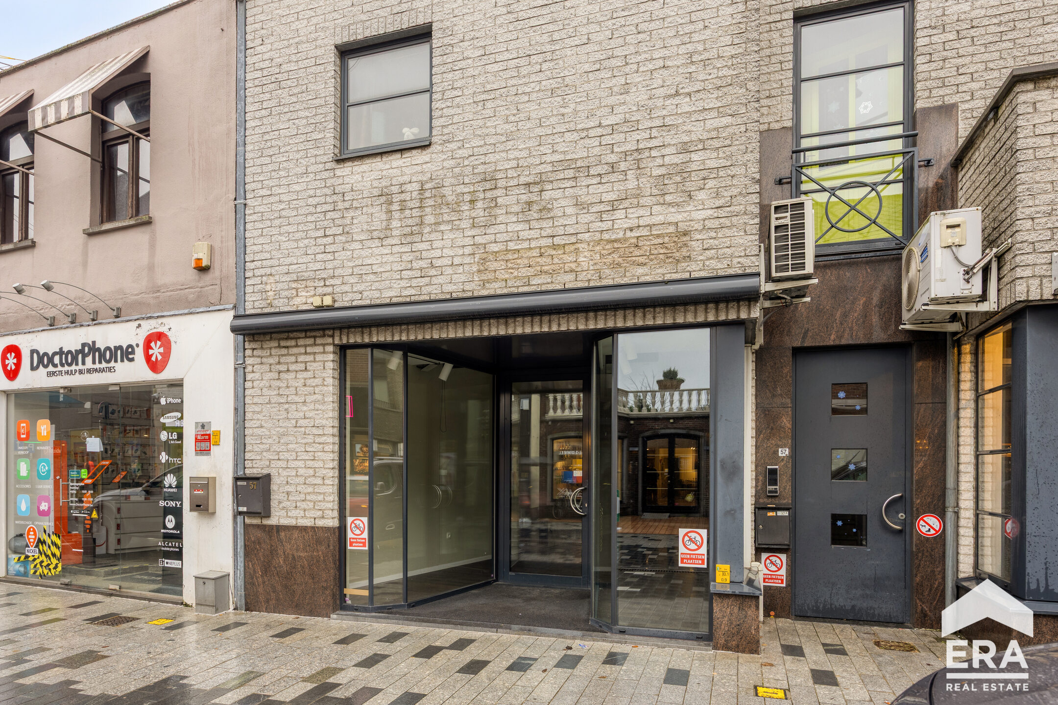 Handelspand met ruime kelderberging te koop in hartje Lommel - foto 2