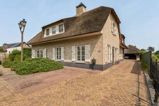 Prachtige rietgedekte villa met zwembad en poolhouse gelegen op een schitterende locatie in Poppel waar u geniet van rust en ruimte op een perceel...