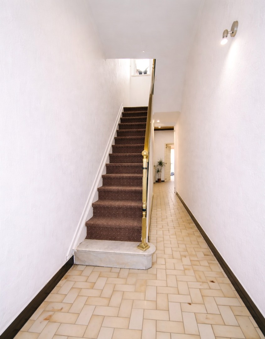 Centraal gelegen woning met drie slaapkamers, tuin én inpandige garage te koop in Sint-Niklaas! - foto 4