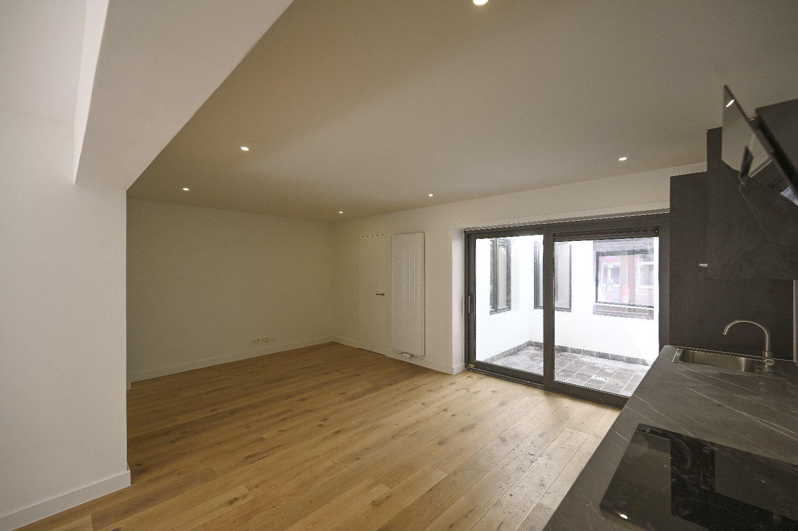 KNAP GELIJKVLOERS APPARTEMENT MET STADSTERRAS - foto 2