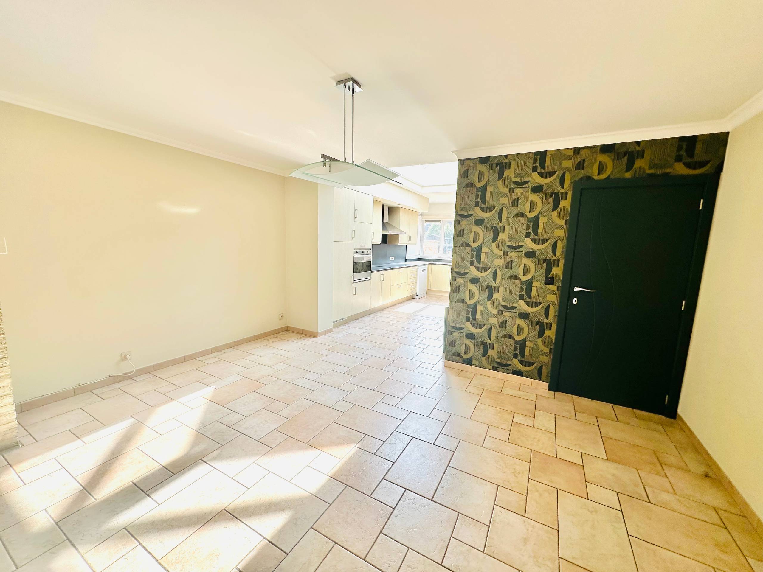 Halfopen woning met garage en zuidgerichte tuin in Roeselare - foto 5