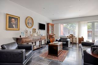 Ruime en instapklare woning met bijgebouw op perceel van 7A 58CA, nabij het centrum van Mol.Bij binnenkomst betreed je een royale inkomhal met...