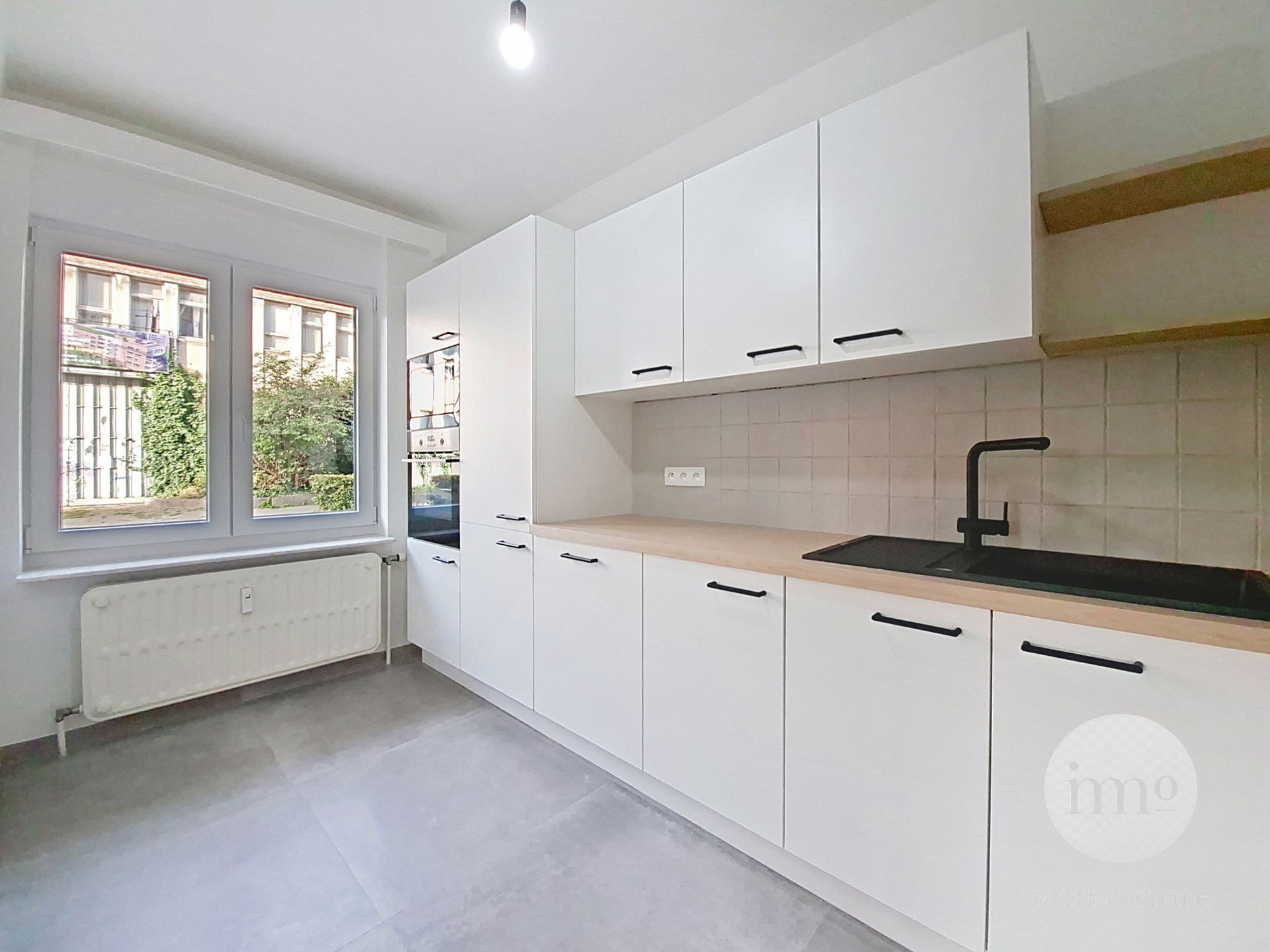 Lichtrijk gerenoveerd 3-slaapkamerappartement - foto 3