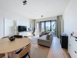 Tour & Taxis - Appartement 1 slaapkamer te huur met ruim overdekt terras (12m²) gelegen naast de nieuwe hotspot 'Gare Maritime'. De centrale...