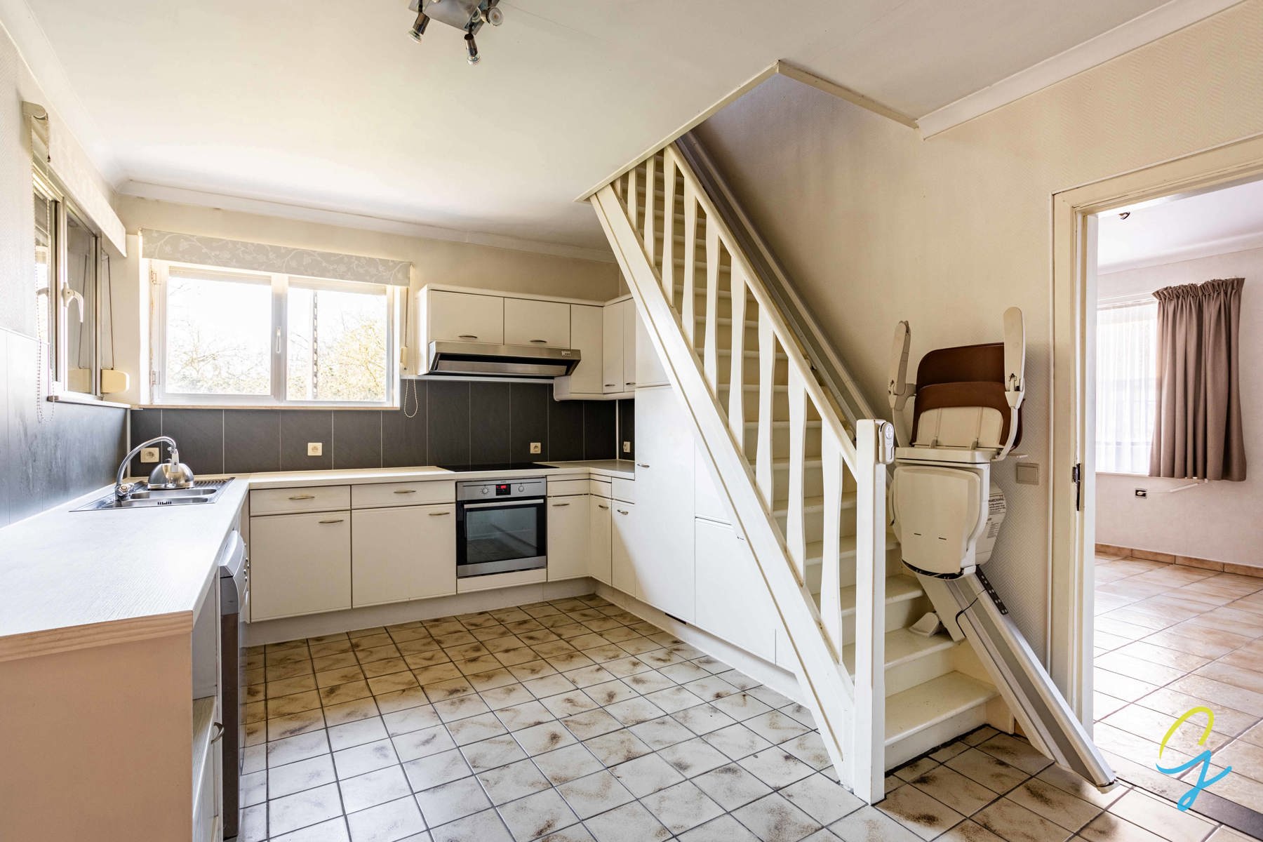 Ruime woning met 4 slaapkamers, garage en tuin te Moerzeke. - foto 5