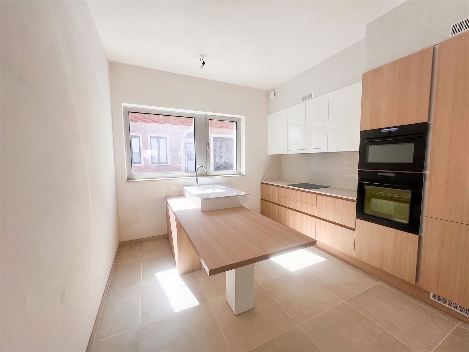 Ruim duplex-appartement met tuin - foto 4