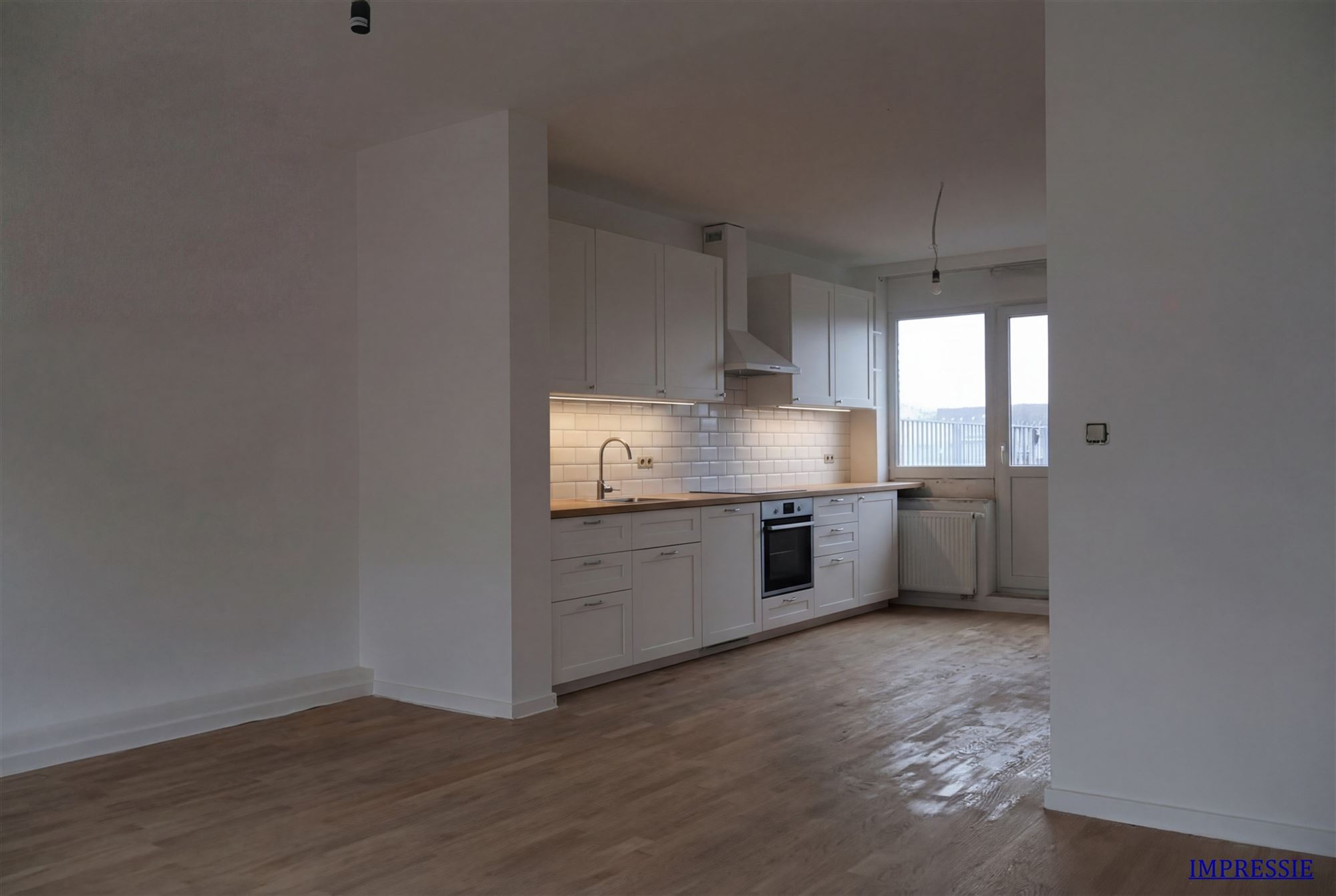 Gerenoveerd triplex appartement in het centrum van Kapellen - foto 4