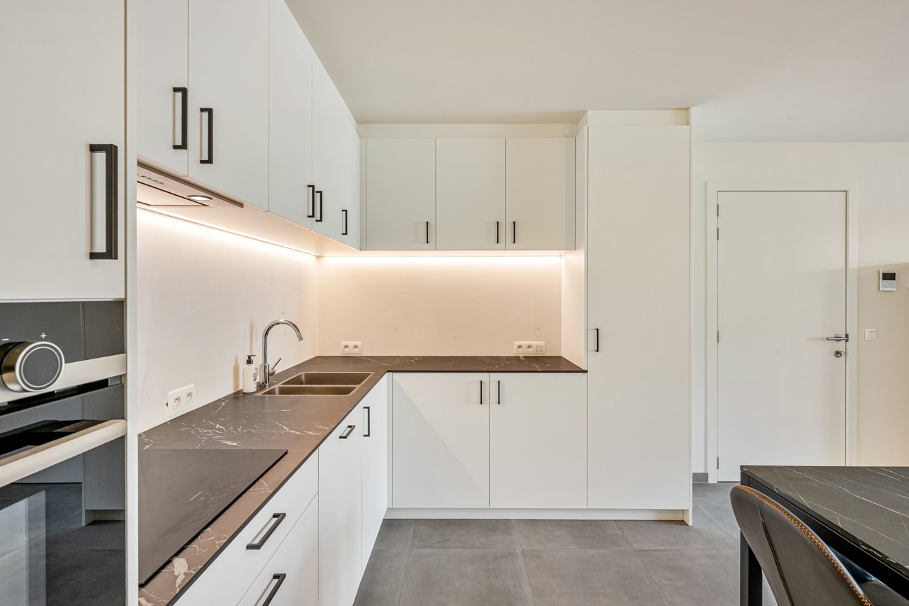 Recent gelijkvloers appartement met tuin en parkeerplaats! - foto 4