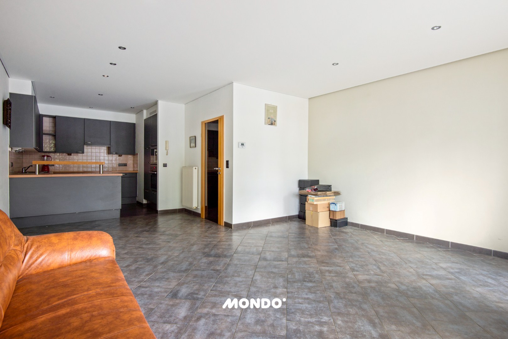 Gelijkvloers appartement met staanplaats en kelderberging! - foto 4