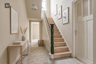 INDELING: <br /><br />Gelijkvloers: <br />- inkomhal<br />- leefruimte met aparte zithoek<br />- ruime keuken met toegang tot de veranda<br />- badkamer<br />- apart toilet<br />- ruime garage (plaats voor 2 wagens achter elkaar)<br />- gezellige tuin met ruim terras<br /><br />Eerste verdieping: <br />- 2 volwaardige slaapkamers<br /><br />Tweede verdieping: <br />- 2 volwaardige slaapkamers<br /><br />Zolderverdieping te bereiken via vaste trap en mogelijk om verder in te richten. <br />Daarnaast is ook nog een kelder aanwezig. <br /><br />Meer info of interesse in een bezoek? <br />Contacteer Sarah - 0493 25 46 80 - sarah.hanson@dewaele.com<br /><br />Bestuursmaatregelen in het maatregelenregister: nee<br /><br />Deze AI-visualisaties zijn bedoeld als inspiratie. Er werd geen rekening gehouden met technische specificaties, stedenbouwkundige voorschriften of de concrete mogelijkheden tot realisatie.