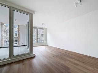 This bright 1-bedroom apartment for rent is located in a new residence in the Bleekhofstraat in Antwerp. In addition, accessibility is guaranteed by the proximity of various access roads and public transport. It is located near Zurenborg.Layout:- entrance hall - laminate living space that gives access to the terrace- cozy indoor terrace- fully equipped open kitchen with all appliances and modern comfort- storage room with connection for washing machine and dryer- bathroom with single sink and walk-in shower, toilet and towel dryer- spacious bedroom of approximately 12 m² with a terrace overlooking the courtyard- additional basement storage of 11m²Advantages:- new construction - extra basement storage and 2 places in the communal bicycle shed- terrace Monthly commission costs: 50 euro per month Are you interested in this apartment for rent in Antwerp? Don't hesitate to contact us. Do you also want to sell or rent your property? We are happy to help you out. Always at your service to help you with all your questions about real estate.