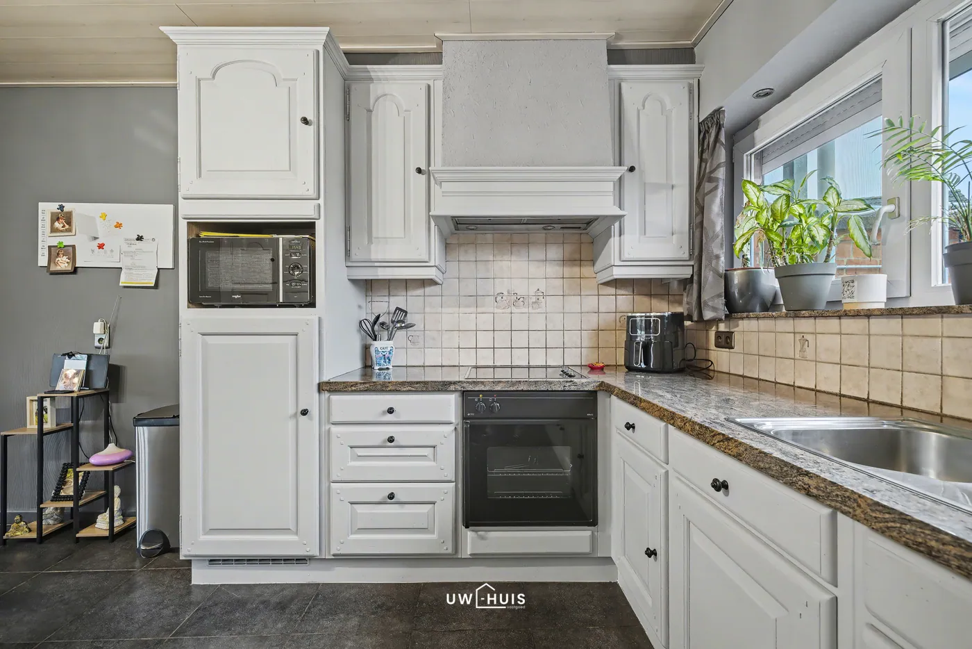 Gerenoveerde kangoeroewoning met 4 slaapkamers, garage en tuin in het centrum van Stekene - foto 5