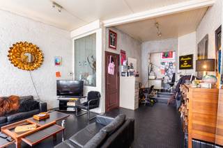 Authentieke woning met winkel in de Nosestraat tussen het Eilandje en het historische stadscentrum, op wandelafstand van de Scheldekaaien met zicht...