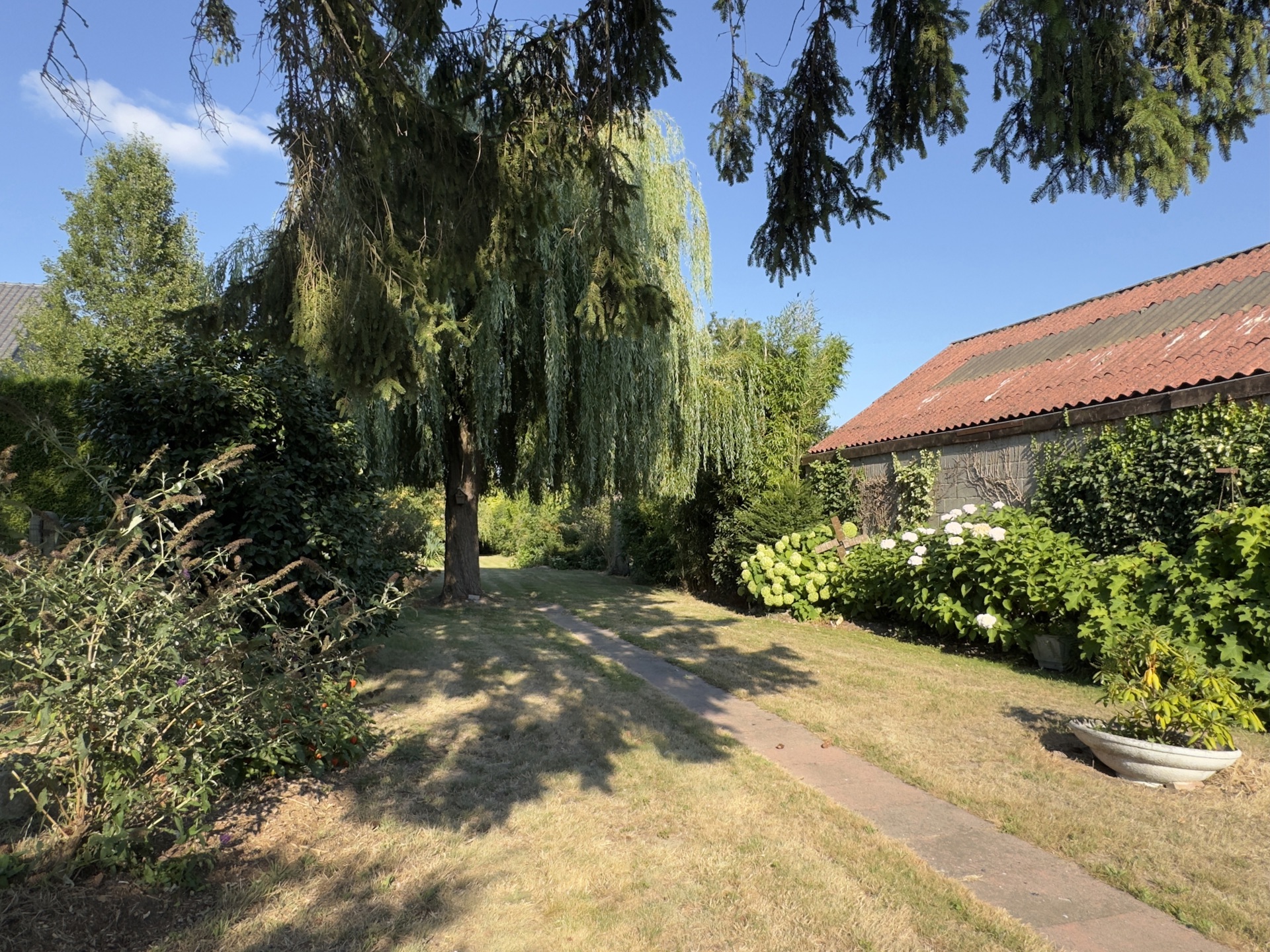 Ruime, charmante woning met 4 slk en prachtige tuin - foto 4