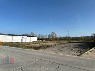 KMO-grond met een oppervlakte van 3.329 m² te koop op amper 2,5 km van de Stationsstraat (N36) en de Oudenaardebaan (N8). De site is gelegen in...