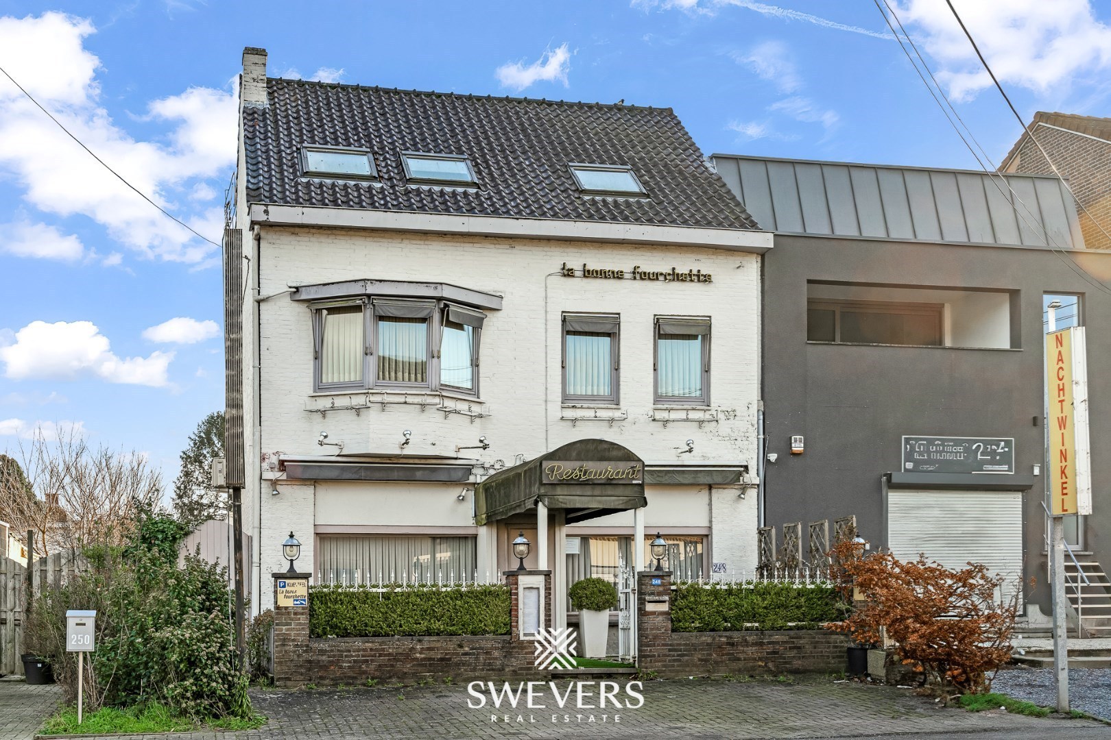 Duplex-appartement met handelsruimte, terras en tuin op toplocatie Riemst - foto 1